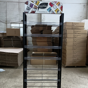 Estante de exhibici&oacute;n al por menor de m&uacute;ltiples niveles del metal con los estantes de acr&iacute;lico y la se&ntilde;alizaci&oacute;n superior, ideal para los escaparates de la comida/de productos
